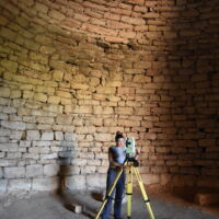 Reflectorless total station measurements of the stone construction work inside the Tiryns tholos tomb, Argolid (Greece). Photo: A. Brysbaert.