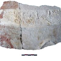 Pithos fragment bearing a cylinder-seal frieze in relief depicting a chariot-hunting scene. Maa-Palaeokastro (Cyprus). Late Cypriot IIC/Late Cypriot IIIA period (end of 13th/early 12th centuries BCE).
Photograph by Artemis Georgiou, reproduced by permission of the Director of the Department of Antiquities,Cyprus.