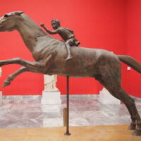 Bronze sculptural group of the ‘Horse and Jockey,’ one of two ancient bronze sculptures found in a fragmentary condition at the sea off Cape Artemission (Greece). National Archaeological Museum, Athens. © Katerina Velentza.