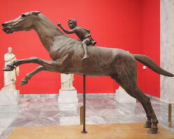 Bronze sculptural group of the ‘Horse and Jockey,’ one of two ancient bronze sculptures found in a fragmentary condition at the sea off Cape Artemission (Greece). National Archaeological Museum, Athens. © Katerina Velentza.